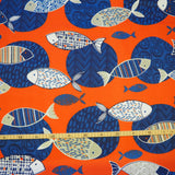 Fische auf Orange Baumwolle Dekostoff